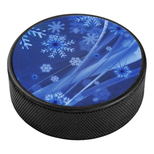 Blauwe wintersneeuwkerst hockey puck (3/4)