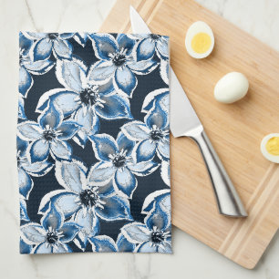 Blauwe, witte bloemen op een zwarte achtergrond. theedoek