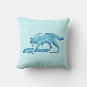 Blauwe wolf op sneeuw kussen