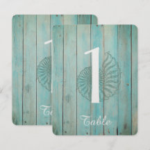 Blauwe Zeeschelp op Houten Bruiloft Tafel Nummer