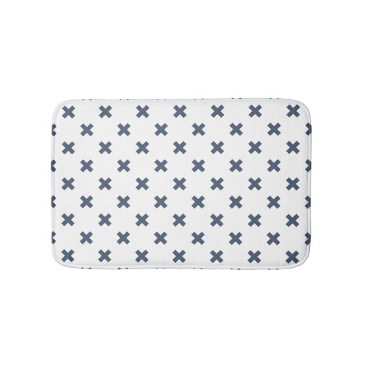 Blauwgrijze kruisstiften op wit badmat (Voorkant)