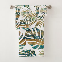 Blauwgroen en gouden gepatterde tropische bladeren