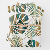 Blauwgroen en gouden gepatterde tropische bladeren inpakpapier vel (In situ)