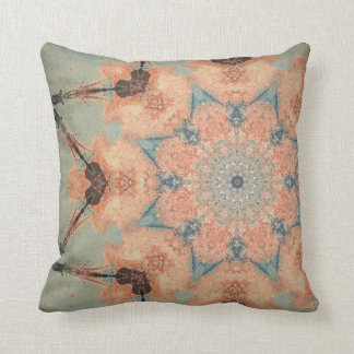 Blauwgroen en oranje kussen