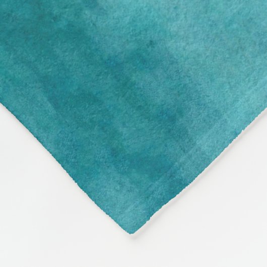 Blauwgroen en perforeel fleece deken (Hoek)