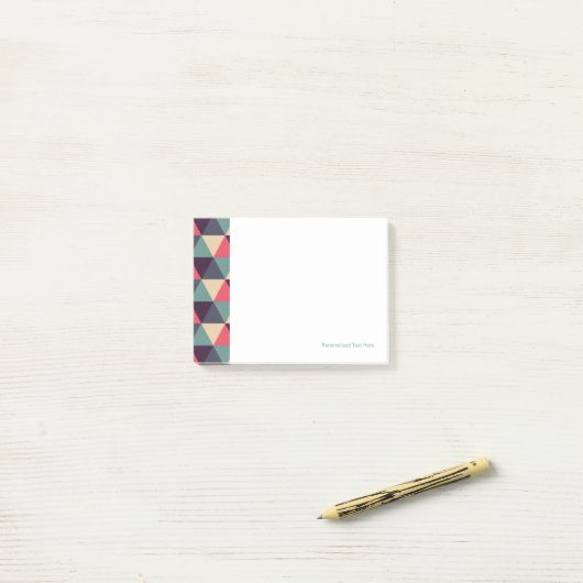 Blauwgroen en roze driehoekspatroon post-it® notes (Op bureau)