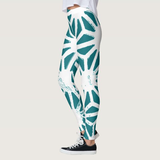 Blauwgroen en wit geometrisch patroon leggings (Links)