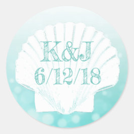 Blauwgroen en witte zeeschelpen voor weddenschappe ronde sticker