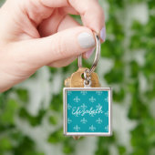 Blauwgroen Fleur de Lis Sleutelhanger (Hand)