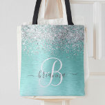 Blauwgroen geborsteld metaal Silver Glitter Monogr Tote Bag<br><div class="desc">Pas dit trendy ontwerp van de canvas tas met  zilveren mousserende glitter eenvoudig aan op een blauwgroen geborstelde metalen achtergrond.</div>