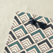 Blauwgroen geometrisch patroon strandlaken (In situ)