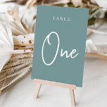 Blauwgroen hand Scripted Table ONE Table Number Kaart<br><div class="desc">De eenvoudige en kische kaarten van het lijstaantal in stoffige blauwgroen en wit maken een elegante verklaring bij uw bruiloft of gebeurtenis. Het ontwerp kenmerkt "lijst [aantal]"in een eyecatching mengeling van klassieke serif en handgeschreven manuscript het schrijven. Het ontwerp herhaalt zich aan beide zijden. Afzonderlijk genummerde kaarten worden apart verkocht;...</div>