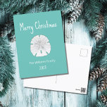 Blauwgroen kerstdagen met tropische beugel feestdagenkaart<br><div class="desc">Tropisch blauwgroen kerstgroen briefkaart met  kerstfeest,  met een zanddollar- en witte typografische vormgeving,  Met aanpasbare letters kunt u uw eigen informatie toevoegen. Geweldig voor het verzenden van goede wensen aan geliefden dit vakantieseizoen.</div>