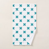 Blauwgroen kruisstiften op wit handdoek (Handdoek)