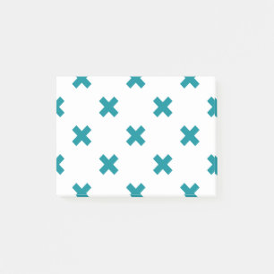 Blauwgroen kruisstiften op wit post-it® notes