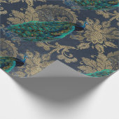 Blauwgroen packs op blauw en goud cadeaupapier (Hoek)