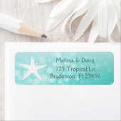 Blauwgroen retouradreslabels voor zeesterren in de etiket (Insitu)