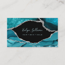 blauwgroen waterverf op zwart