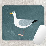 Blauwgroen zeemleder muismat<br><div class="desc">Een juktige zeemeeuw die bij de oceaan staat. Ideaal voor mensen die van vogels houden en voor de kust. Originele kunst van Nic Squirrell.</div>