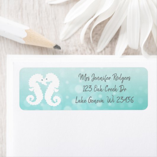 Blauwgroen zeepaardjes strand etiket (Insitu)