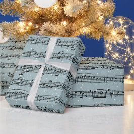 Blauwmuziek op sneeuwvlokken cadeaupapier