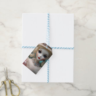 Blauwogige pop, cadeaulabel