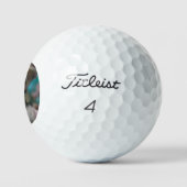 Blauwogige pop, golfballen (Logo)