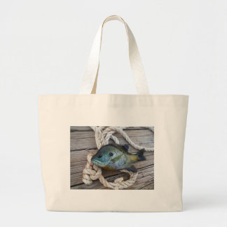 Blauwvintonijn op de haven en aan de touw grote tote bag