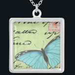 Blauwvleugelvlinder op Blauwgroen Briefkaart Zilver Vergulden Ketting<br><div class="desc">Dit blauwgroen briefkaart draagt een boodschap van schoonheid. Een delicate blauwe vlinder rust op de kaart,  die enkele van het manuscript verduistert het bevat. Deze Vision Studio-afdruk zou een geweldige aanvulling zijn op uw huis!</div>