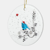Blauwvogel die naar een kersthart kijkt keramisch ornament (Links)