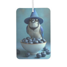 Blauwvogel en een kom blauwe bessen