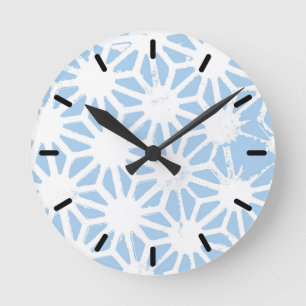 Bleek blauw geometrisch patroon ronde klok