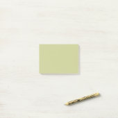 Bleke, groene, vaste kleur post-it® notes (Op bureau)