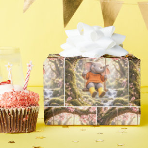 Blij olifant op een schommel van een kersenboom cadeaupapier