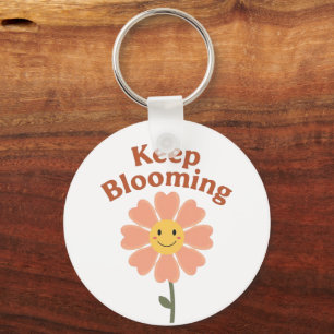 "Blijf Bloeien" Retro Glimlachende Bloem Sleutelhanger