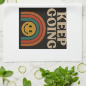 Blijf doorgaan: positiviteit in elke stap theedoek (Gevouwen)