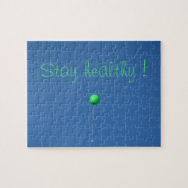Blijf gezond met groene ballon in de lucht legpuzzel
