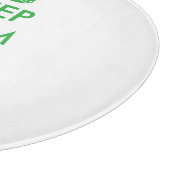 Blijf kalm en hak voedsel rond glazen snijplank (Hoek)