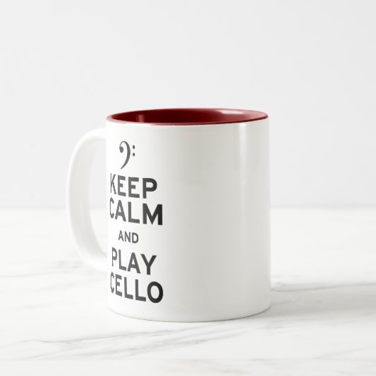 Blijf kalm en speel cello tweekleurige koffiemok (Voorkant links)