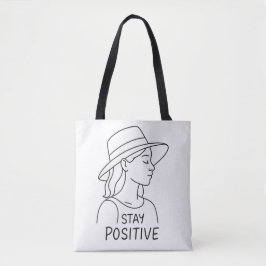 Blijf positief en straal optimisme en kracht uit tote bag