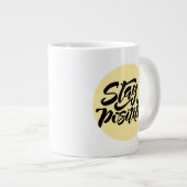 Blijf positief geel grote koffiekop (Voorkant rechts)
