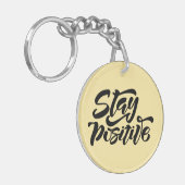 Blijf positief geel sleutelhanger (Voorkant Links)