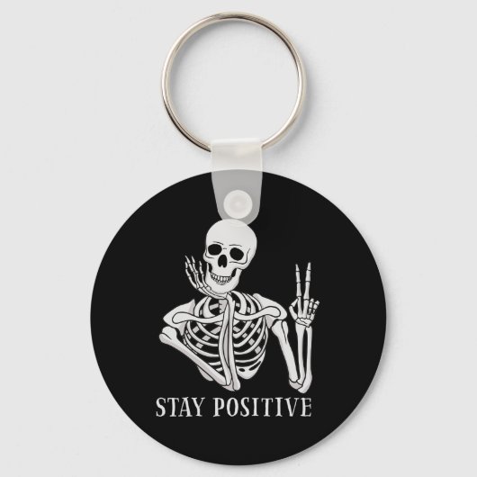 Blijf positief Nooit Beter Skelet Grappig Hallowee Sleutelhanger (Voorkant)