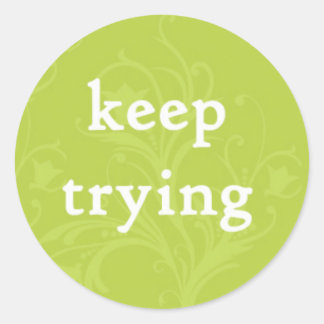 Blijf proberen op een groene achtergrond ronde sticker