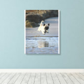 Blijgebaar Puggeltje dat langs de Oceaan springt Canvas Afdruk (Insitu (Houten vloer))