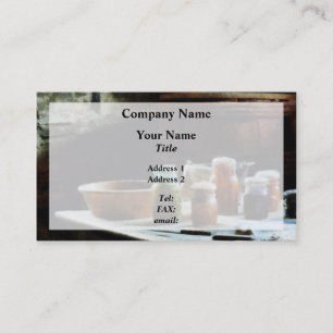 blikken met kleurrijke groenten visitekaartje