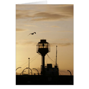 Blikschip bij zonsondergang