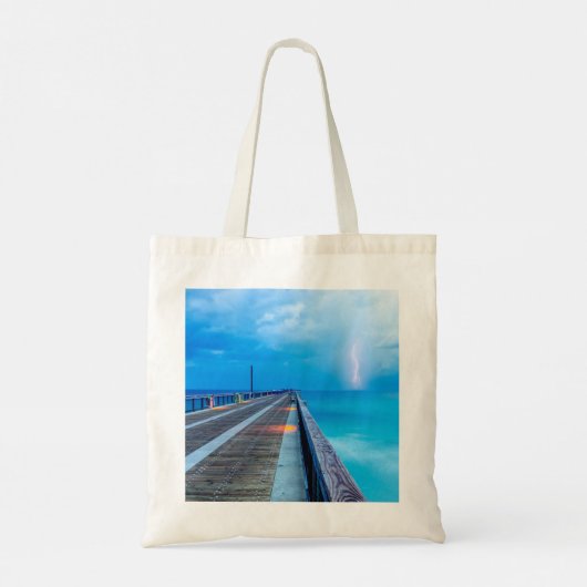 bliksem op Navarra Beach pier Tote Bag (Achterkant)