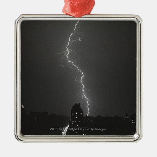 Bliksem over stad metalen ornament (Voorkant)