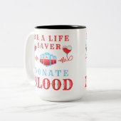 Bloeddonormaand kan een levensreddende donatie van tweekleurige koffiemok (Voorkant links)